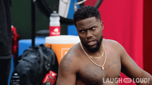 Shirtless Man Stands In Front Of Laugh Out Loud Advertisement GIF