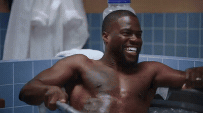 Shirtless Man Taking Bath In Bathtub With Hose GIF