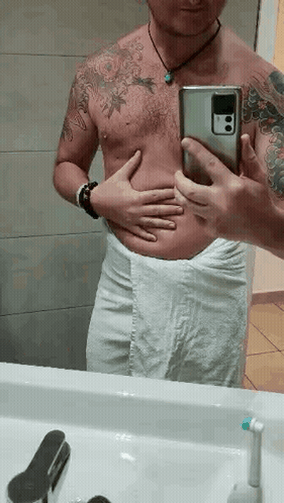 Shirtless Man Taking Bathroom Mirror Selfie GIF