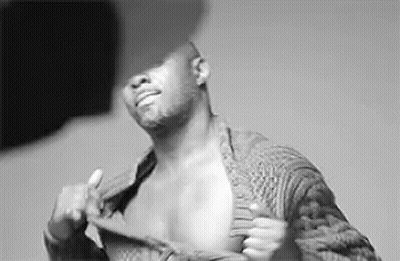 Shirtless Man Taking Off Sweater Black And White GIF