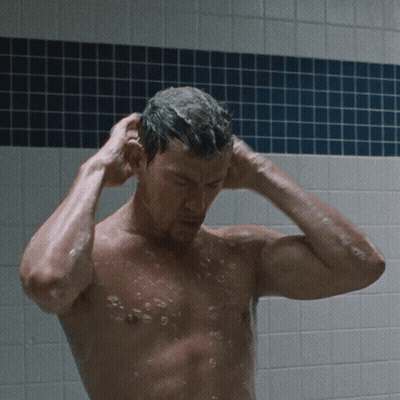 Shirtless Man Washing Hair In Shower GIF