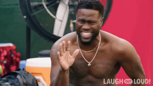 Shirtless Man Waves Hand In Front Of Laugh Out Loud Sign GIF