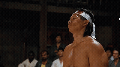 Shirtless Man Wearing Flag Headband GIF