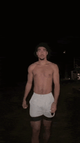 Shirtless Man Wearing Hat And Shorts GIF