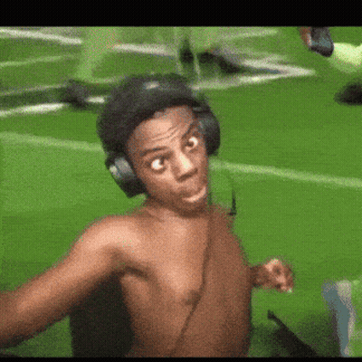 Shirtless Man Wearing Headphones Taking Selfie On Field GIF