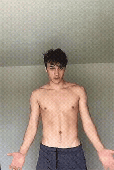 Shirtless Man With Arms Outstretched GIF