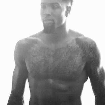 Shirtless Man With Beard And Chest Tattoos GIF