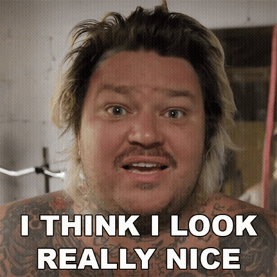Shirtless Man With Beard And Tattoos Says I Think I Look Really Nice GIF