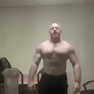 Shirtless Man With Beard Arms Outstretched GIF