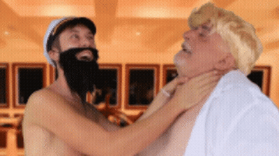 Shirtless Man With Beard Holding Neck GIF