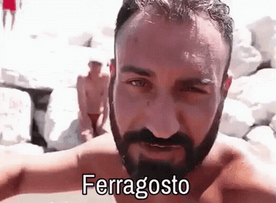 Shirtless Man With Beard In Front Of Rock Wall GIF