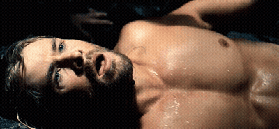 Shirtless Man With Beard Laying On Floor GIF