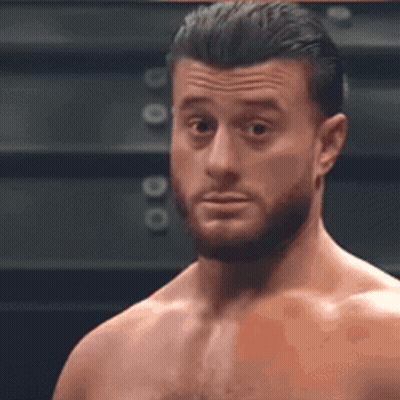 Shirtless Man With Beard Making Funny Face GIF