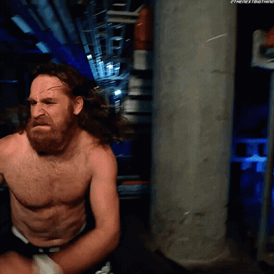 Shirtless Man With Beard 'Next Thing' On Wall GIF