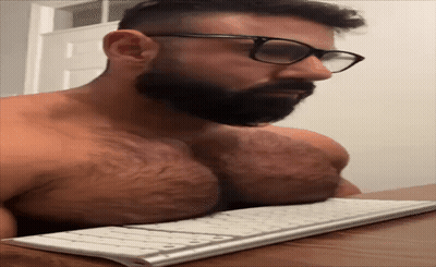 Shirtless Man With Beard Typing On Keyboard GIF
