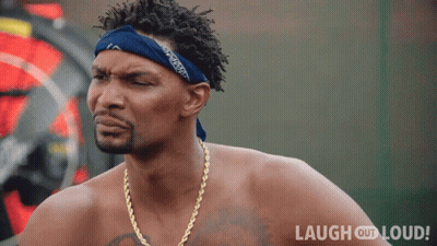 Shirtless Man With Blue Bandana And Gold Chains Saying Laugh Out Loud GIF
