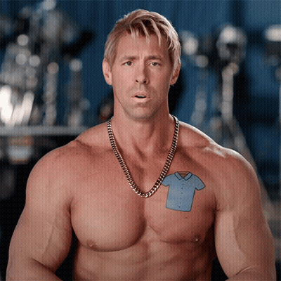 Shirtless Man With Blue Shirt Chest Tattoo GIF