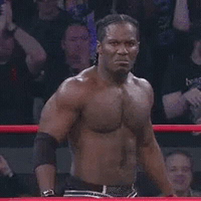 Shirtless Man With Braids Smiling GIF