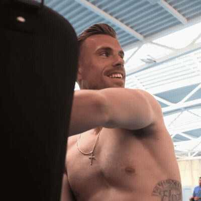 Shirtless Man With Flexi Chest Tattoo GIF