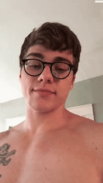 Shirtless Man With Glasses And Chest Tattoo GIF