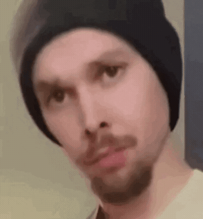 Shirtless Man With Happy Chest Tattoo GIF