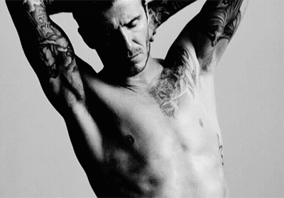Shirtless Man With Jesus Tattoo GIF
