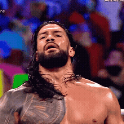Shirtless Man With Long Hair And Beard In Crowd GIF