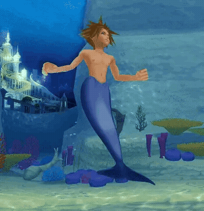 Shirtless Man With Mermaid Tail Standing In Water GIF