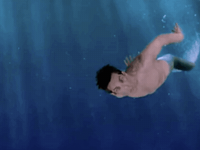 Shirtless Man With Mermaid Tail Swimming GIF