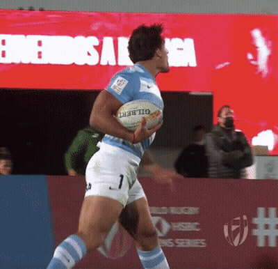 Shirtless Man With Open Mouth In Front Of Crowd GIF