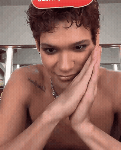 Shirtless Man With Tattoo Making Funny Face GIF
