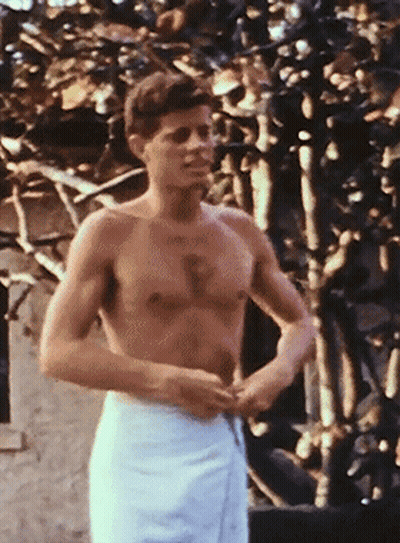 Shirtless Man With Towel And Chest Tattoo GIF