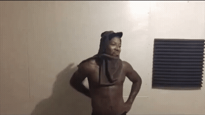Shirtless Man With Towel Around Neck GIF