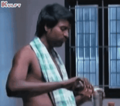 Shirtless Man With Towel At Window GIF