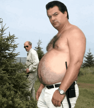 Shirtless Man With Walkie Talkie GIF