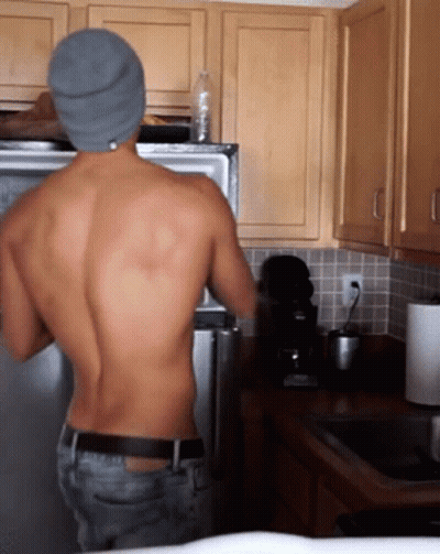 Shirtless Man With Water Bottle In Refrigerator GIF
