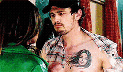 Shirtless Man With Woman Tattoo Next To Woman GIF