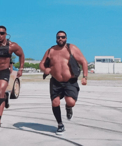 Shirtless Men Running GIF