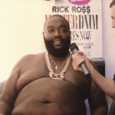 Shirtless Rick Ross Being Interviewed GIF