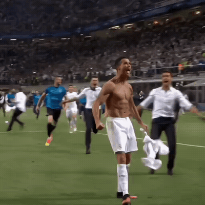 Shirtless Soccer Player Celebrating With Teammates GIF
