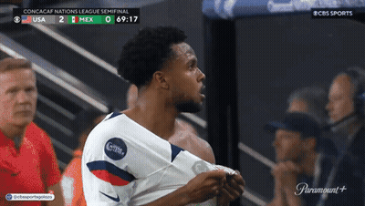 Shirtless Soccer Player In Front Of CBS Sports Ad GIF