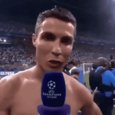 Shirtless Soccer Player Speaking Into Microphone GIF