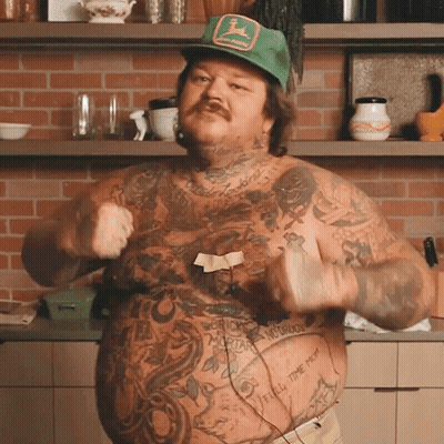 Shirtless Tattooed Man In Green John Deere Hat Thumbs Up GIF