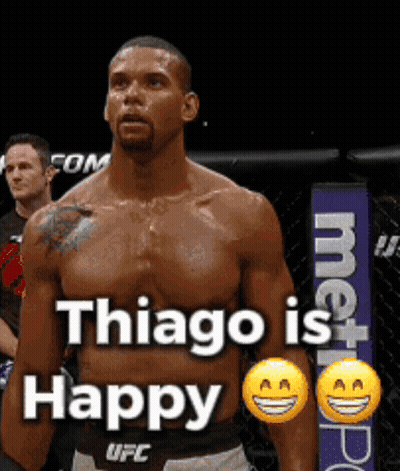Shirtless UFC Fighter In Front Of Thiago Is Happy Sign GIF