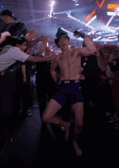 Shirtless UFC Fighter In Purple Shorts Dancing GIF