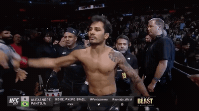 Shirtless UFC Fighter Walking Through Crowd GIF