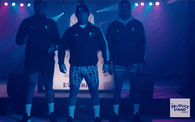Shirtless Wrestler Holding Championship Belt GIF