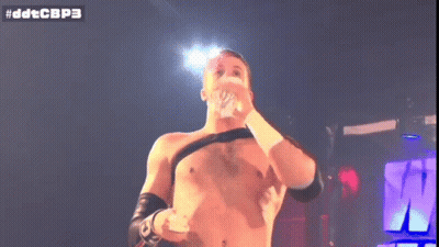 Shirtless Wrestler Holding Microphone GIF
