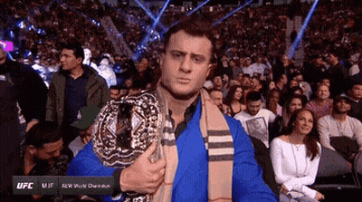 Shirtless Wrestler In Blue And White Star-Spangled Trunk GIF
