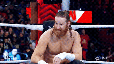 Shirtless Wrestler In Ring Saying Wweraw GIF